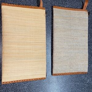 Two clutch purses.  One beige one gray and beige